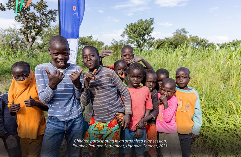 Children playing rope skipping game during an organised Play Session, Palabek Refugee Settlement, Uganda, October, 2021